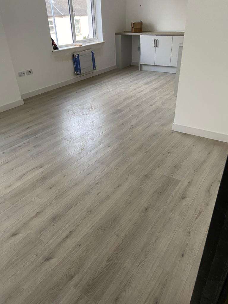 Grey oak laminate floor, by ANG Carpentry & Building Services